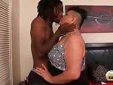 Horny tough black guy is caressing his heavy ebony t-girlfriend.